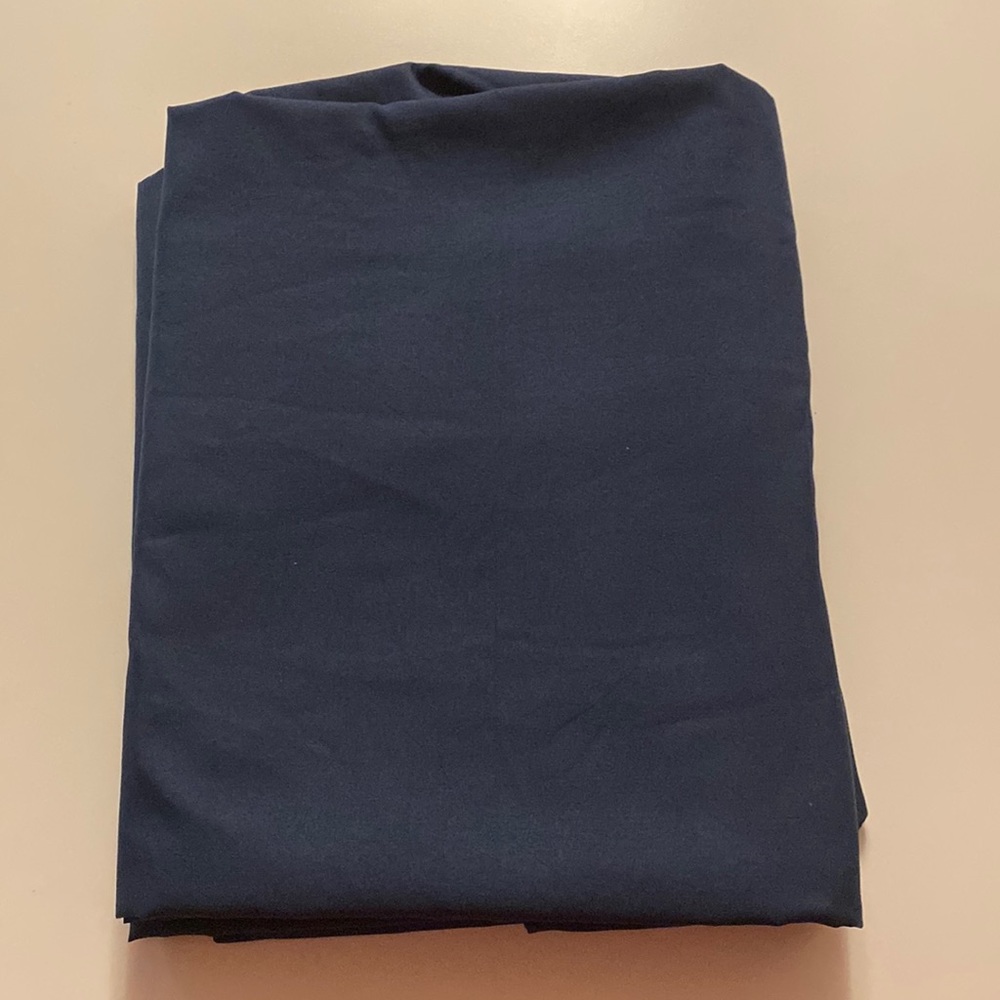 Two (2) Navy blue twin flat sheets